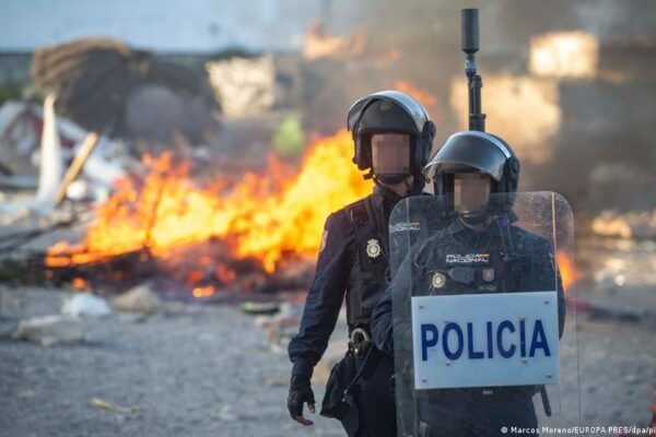 Protesters clash with police, set fire to Ceuta migrant camp