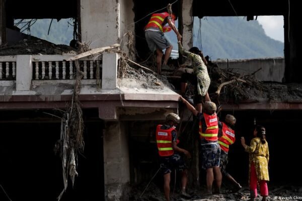 Nepal-China flood rescue on hold as lake breaks banks