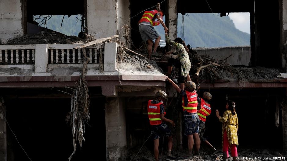Nepal-China flood rescue on hold as lake breaks banks