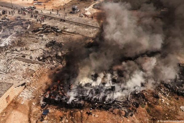 Syria arms depot explosion kills at least 14